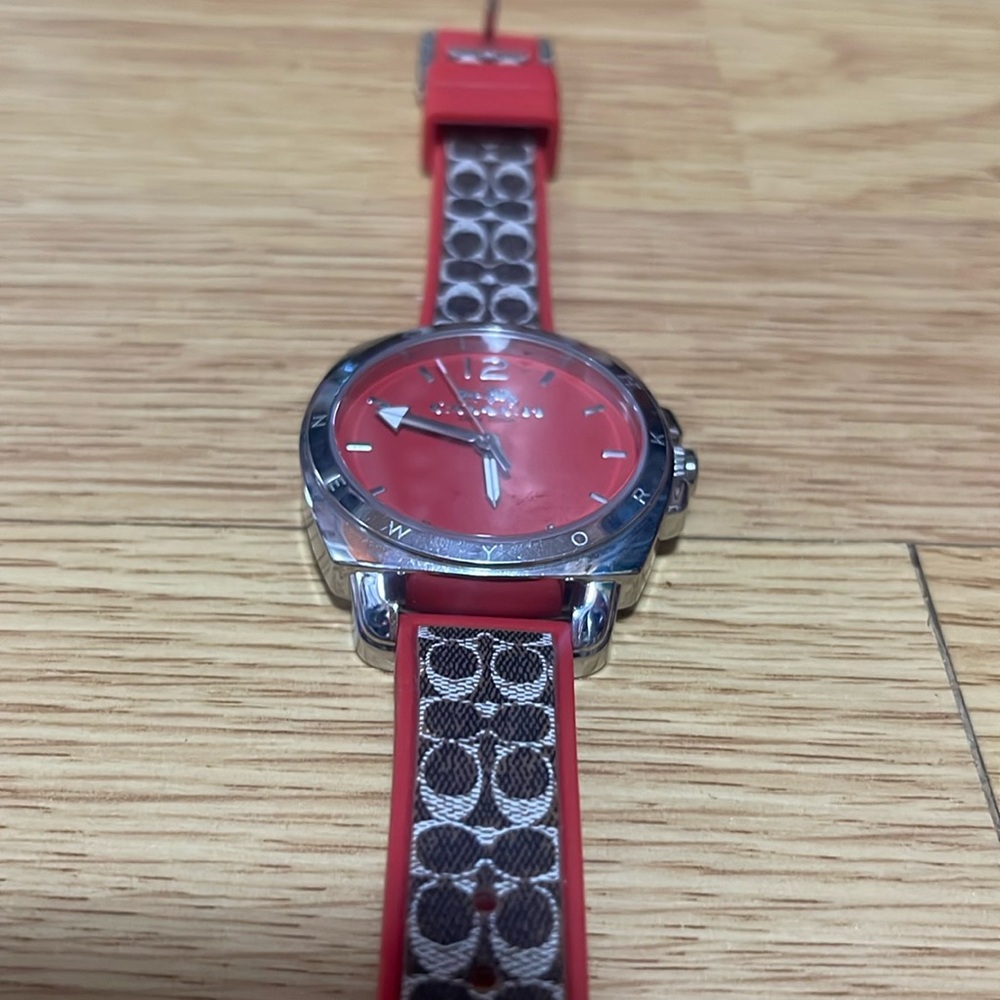 COACH WATCH WITH SIGNATURE BROWN WITH RED RUBBER TRIM AND RED/SILVER FACE WATCH